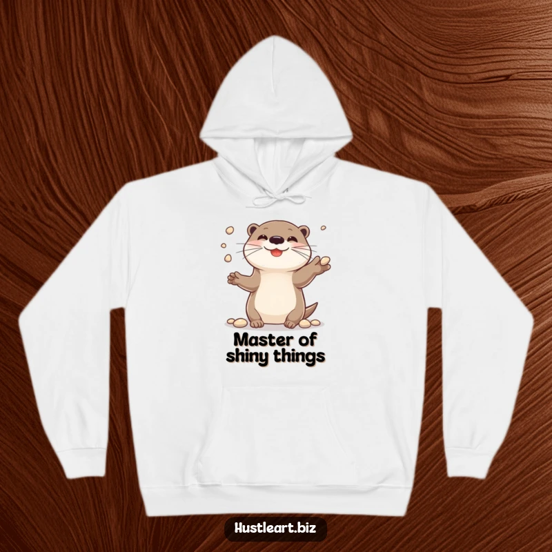 Funny hoodie with a cheerful otter smiling while juggling small shiny pebbles, perfect for warmth and coziness.